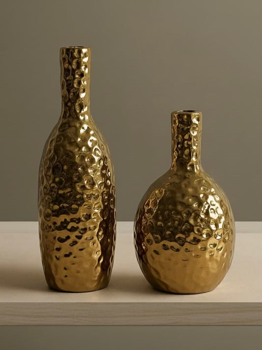 Golden hammered vases