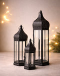Elegant black lanterns with dome tops